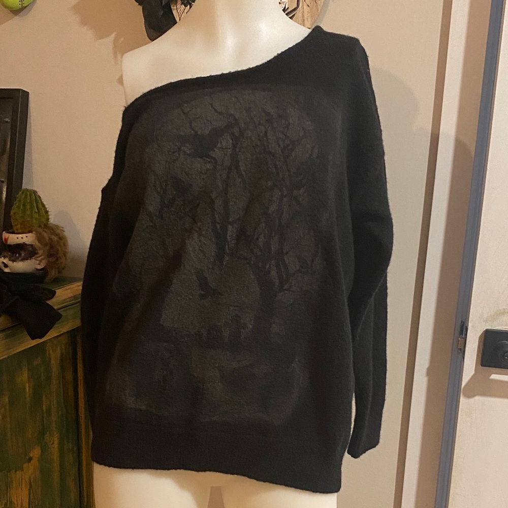 SHEIN Black Off-Shoulder Sweater with Artistic Design